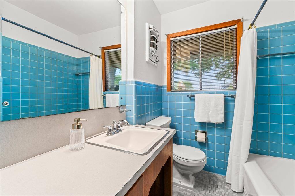 Guest Bathroom located in hallway.
