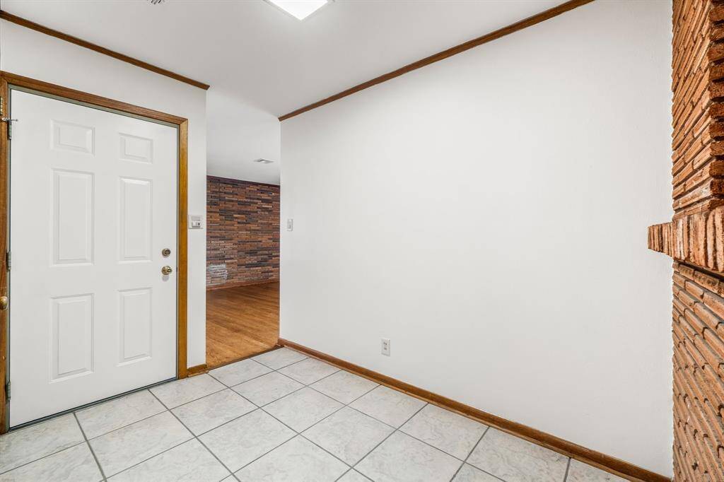 Front Entry looking into living room. Notice the freshly painted walls in a neutral color!