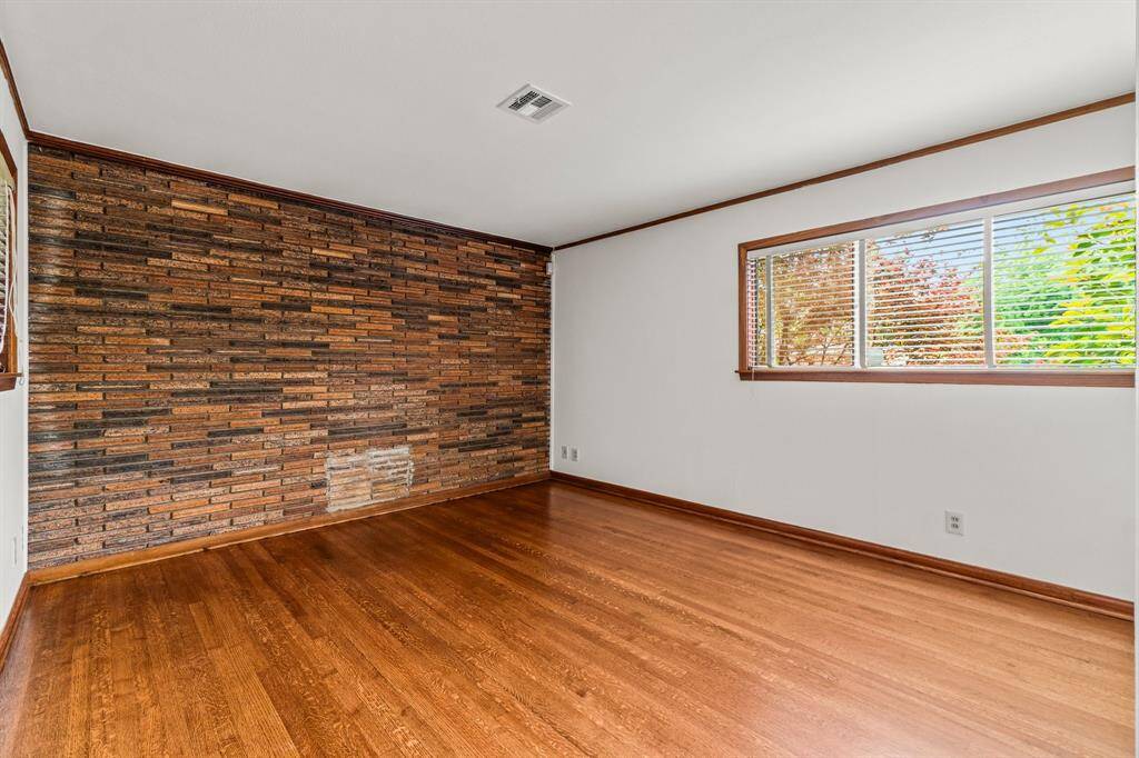 Large Living Room - Notice the beautiful refinished hardwood floors!