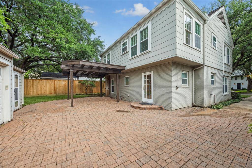 View of backyard from driveway.