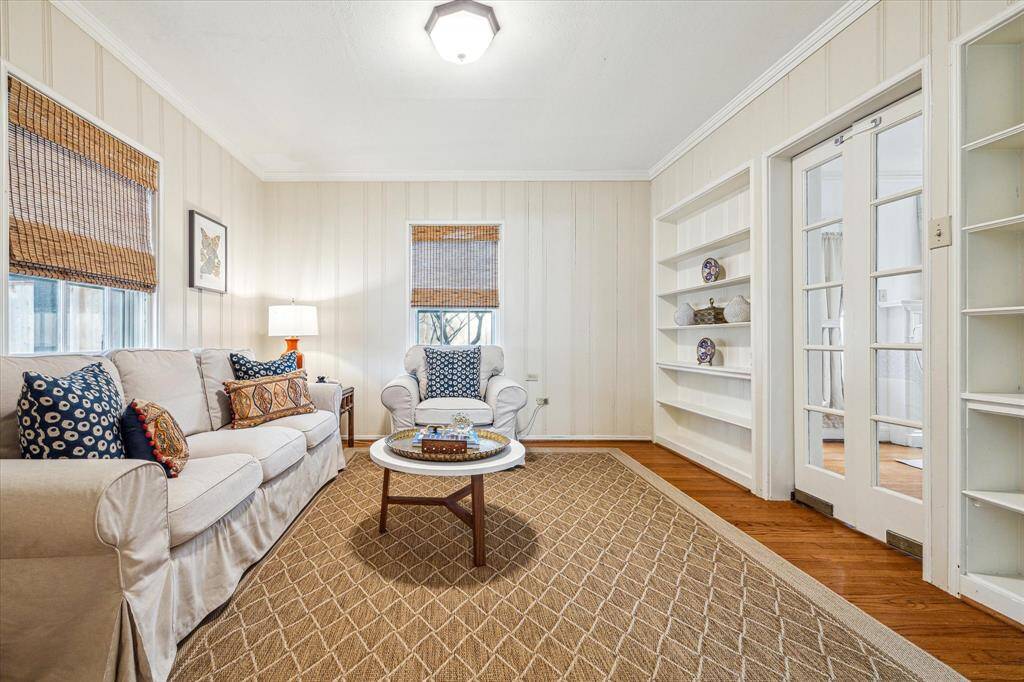 Another view of the family room. Note the double French doors open to the formal living room allowing great entertaining & family living flow.