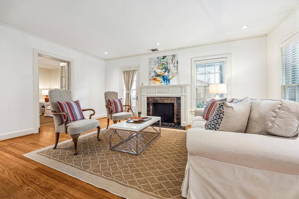 Center hall formals with spacious living room overlooks pretty front yard.