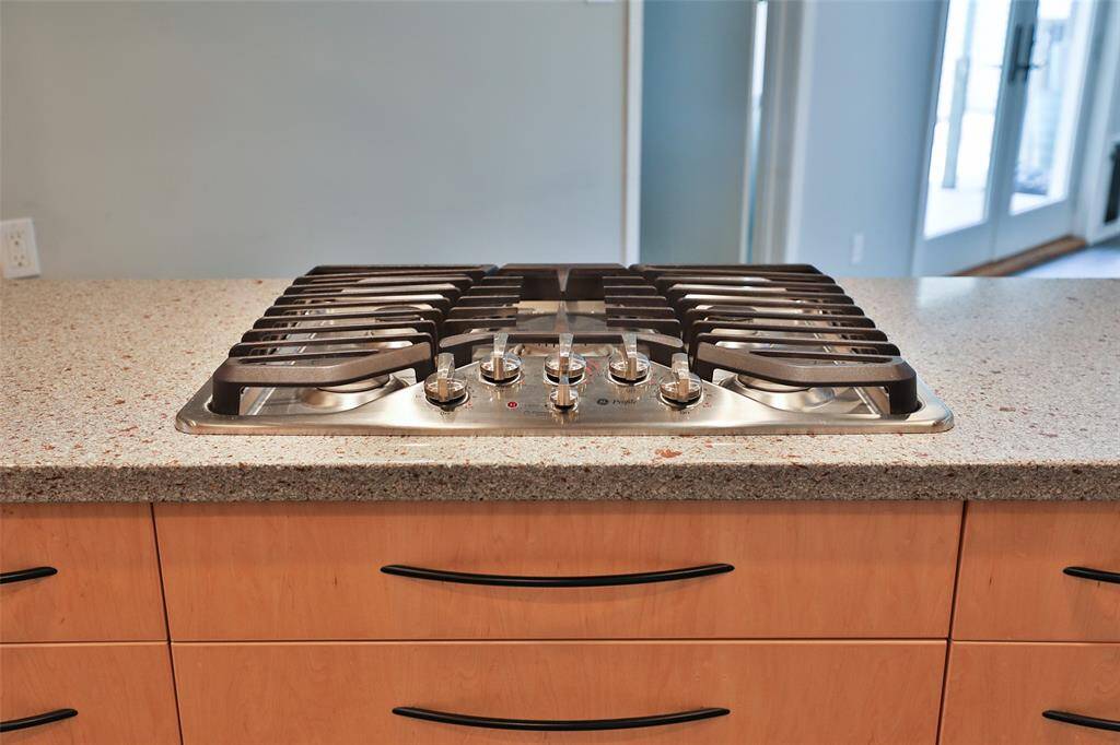 Enjoy cooking on your 5 burner stainless cooktop.