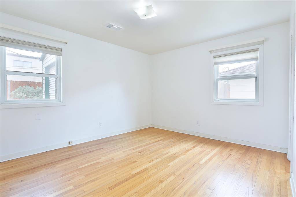 Your back bedroom that was once the primary bedroom.