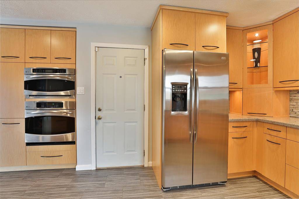 Stainless appliances include oven, microwave, cook top and vent,  refrigerator and dishwasher.
