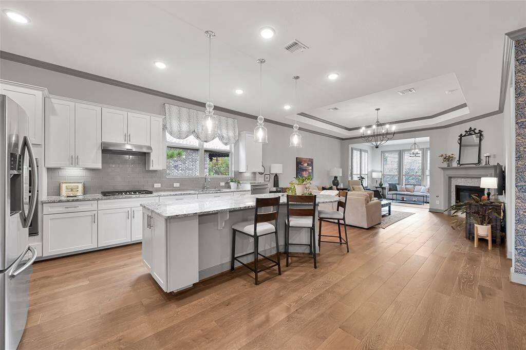 The open concept floor plan is a favorite for hosting family and friends.