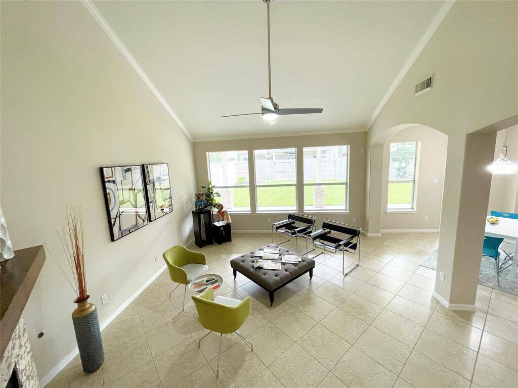View of the high ceilings in the living and social areas.