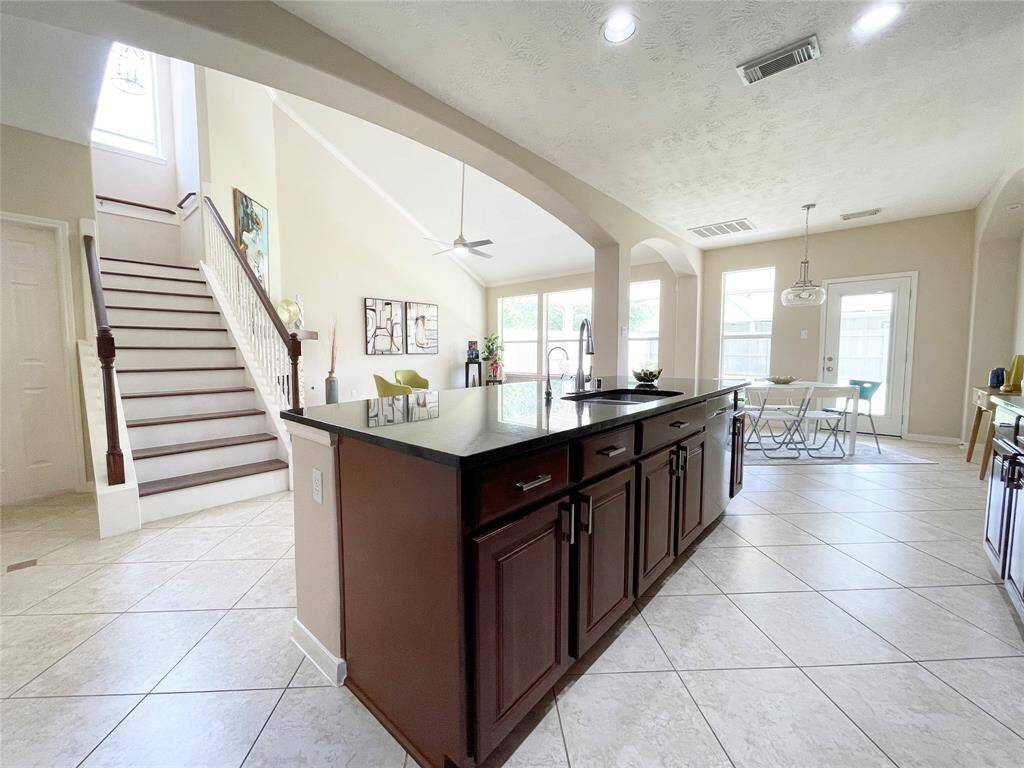 Great view from the kitchen to the breakfast and living room areas.