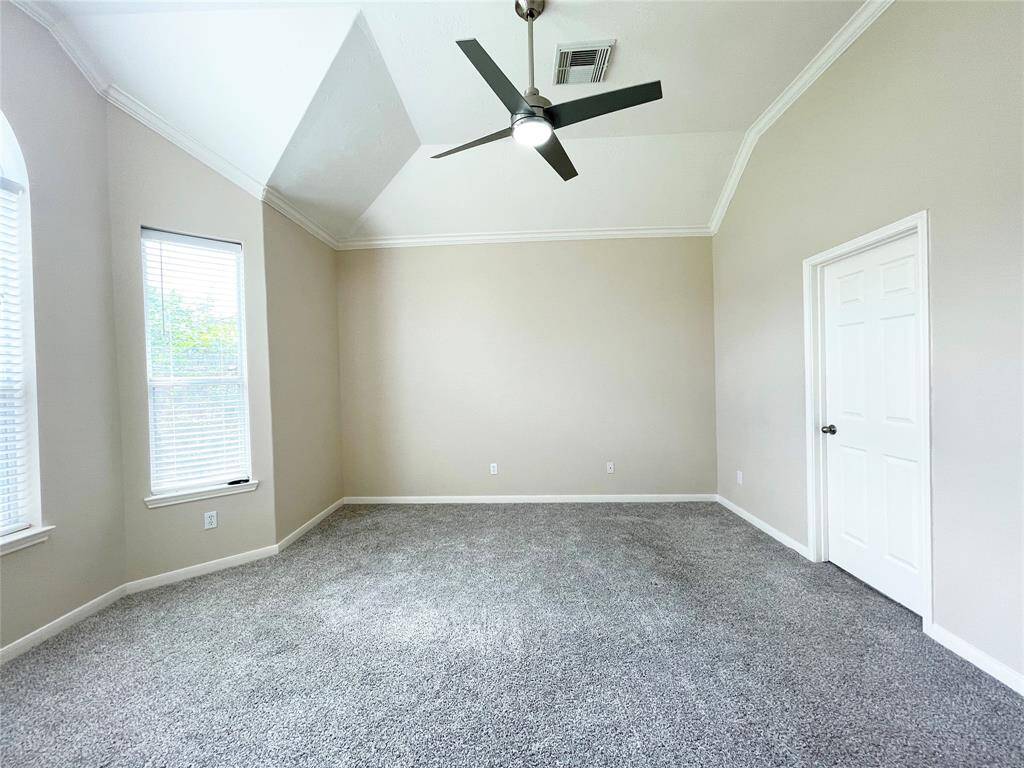 Another view of the primary bedroom.
