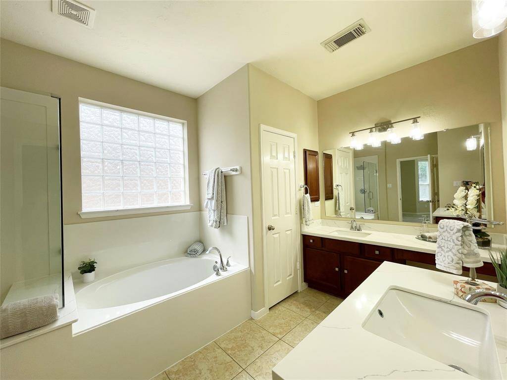 Another view of the primary bathroom.