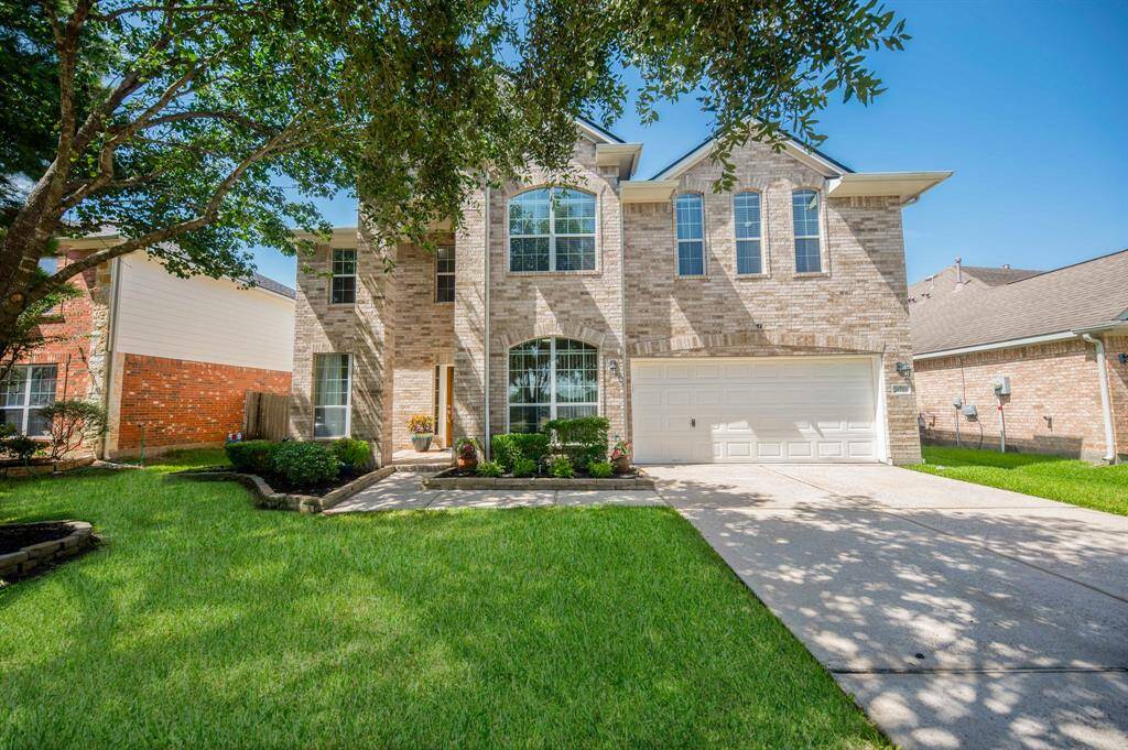 Another view of the front elevation of this stunning home.