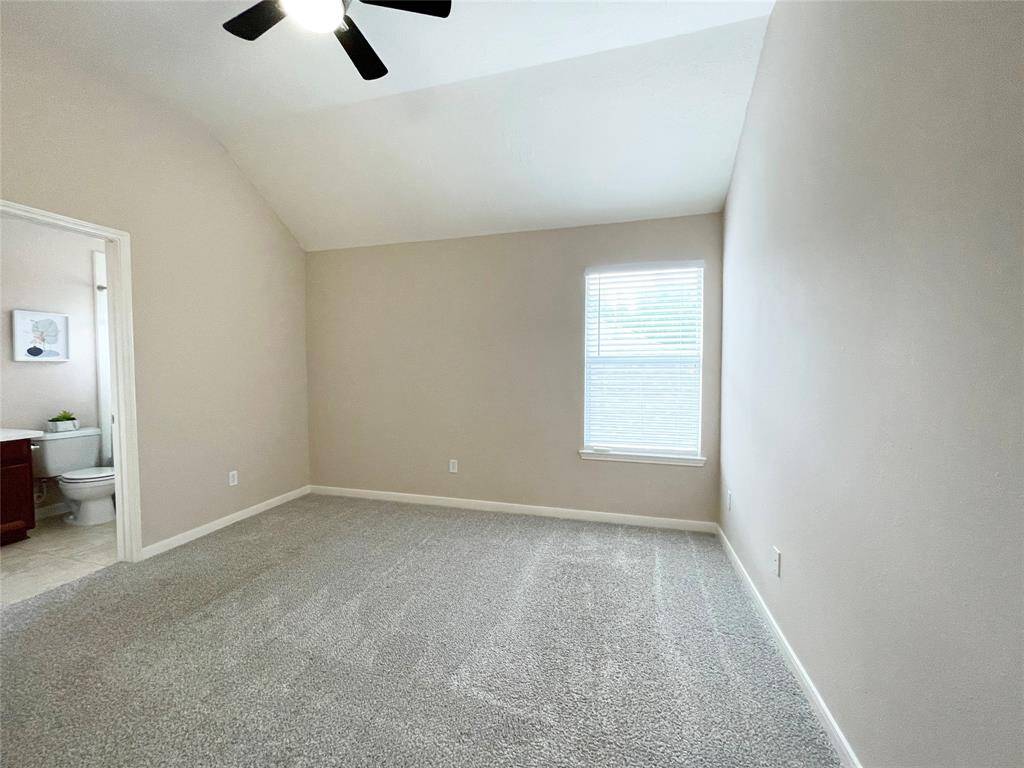 Another view of one of the secondary bedrooms.