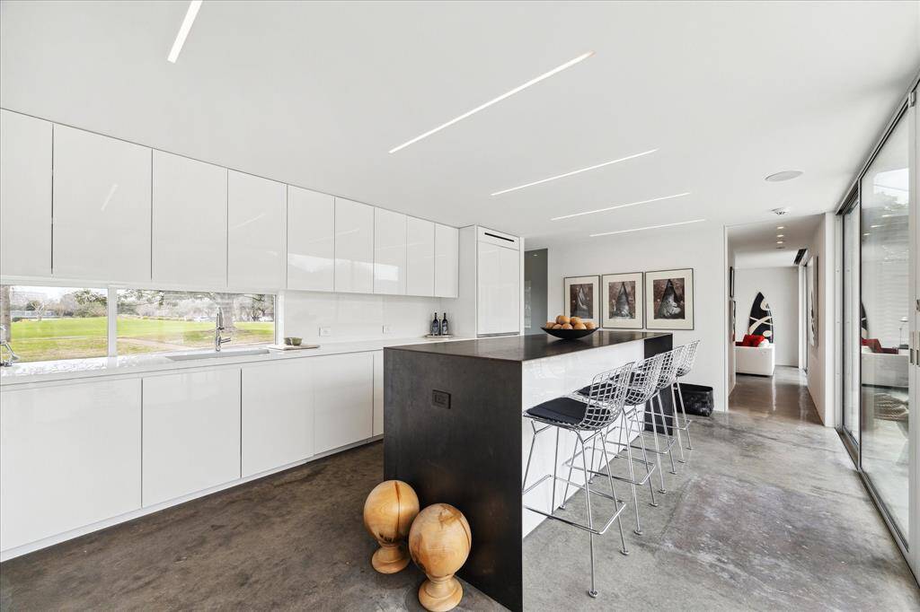 Chef's worthy kitchen featuring high end Bosch and SubZero appliances, Scotsman icemaker and separate beverage fridge.