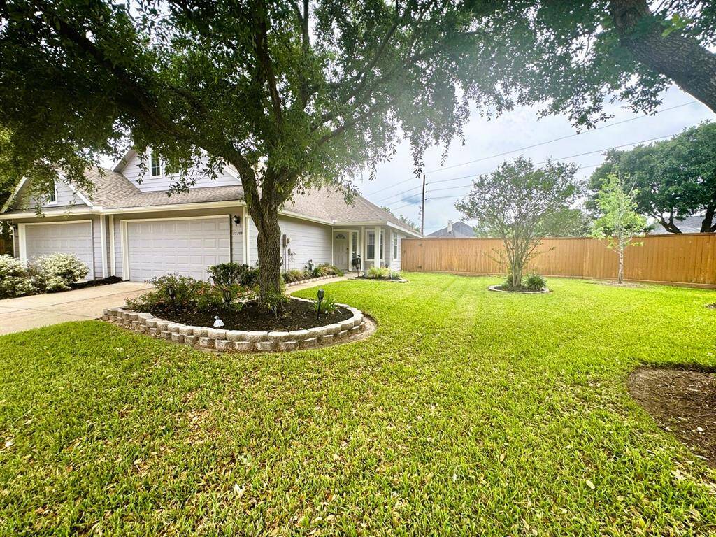 Lots of custom landscaping and yard in between neighbors.