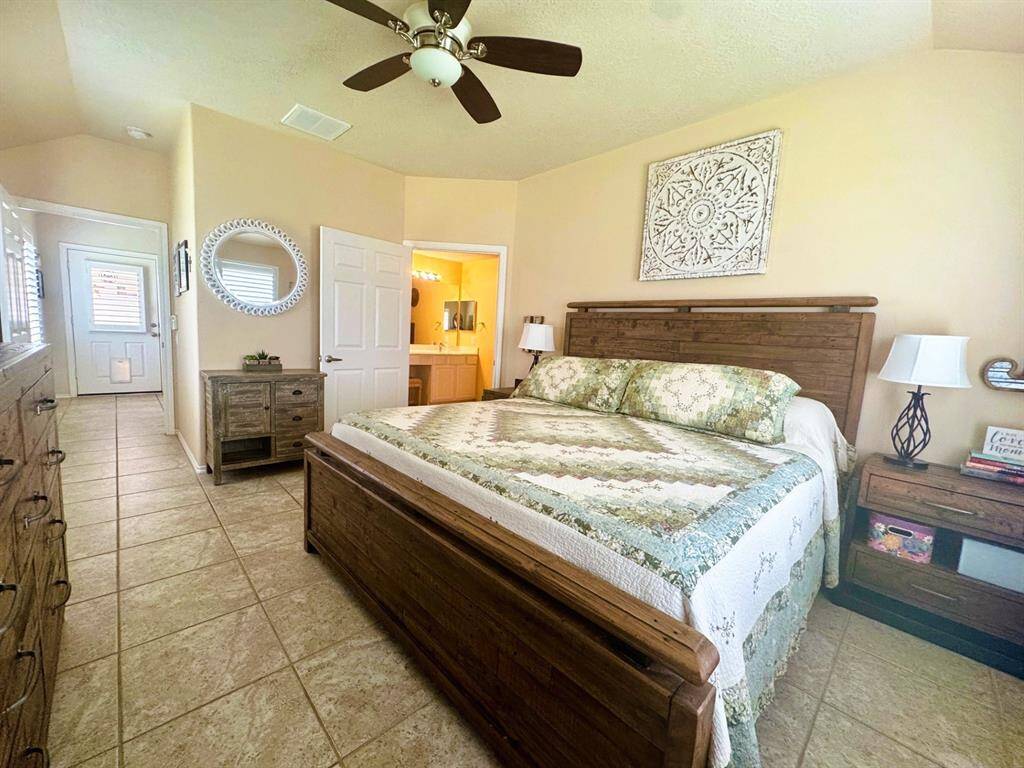 Another view of primary bedroom.