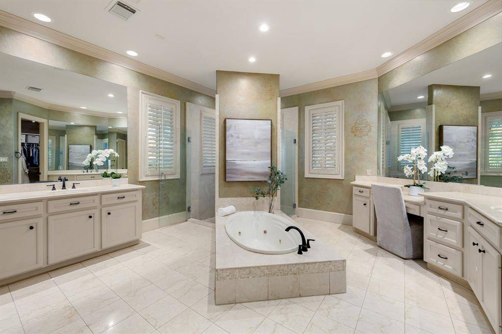 Jetted tub, walk-in shower and two massive walk-in closets