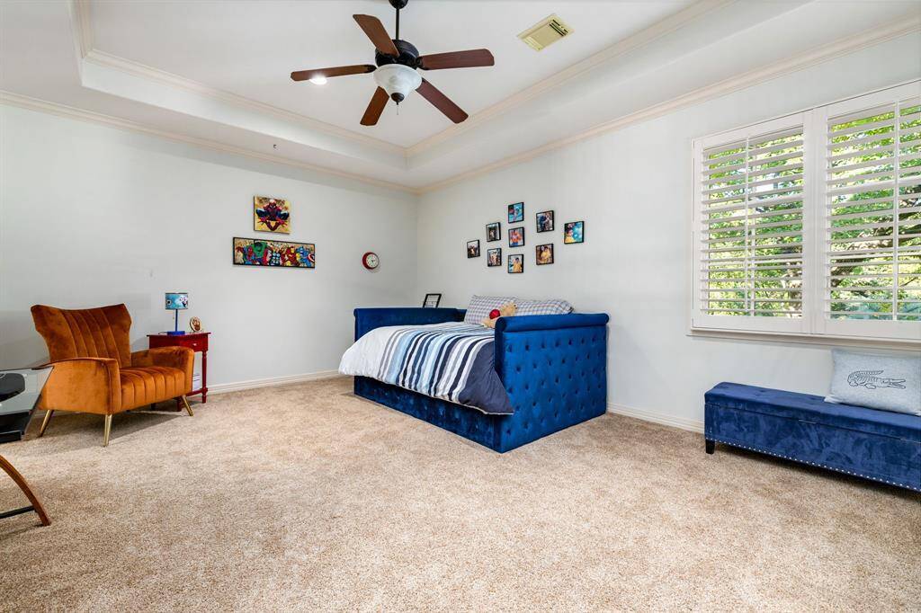 One of 3 spacious en suite bedrooms upstairs