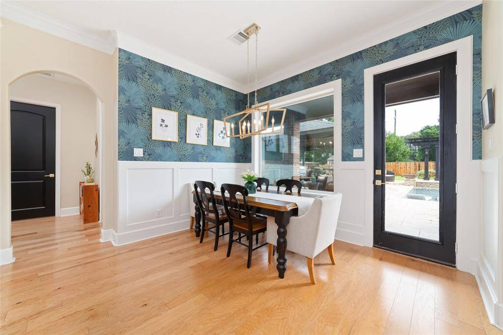 Amazing breakfast area looking out to the stunning backyard!  Imagine sitting here sipping on your coffee in the morning.