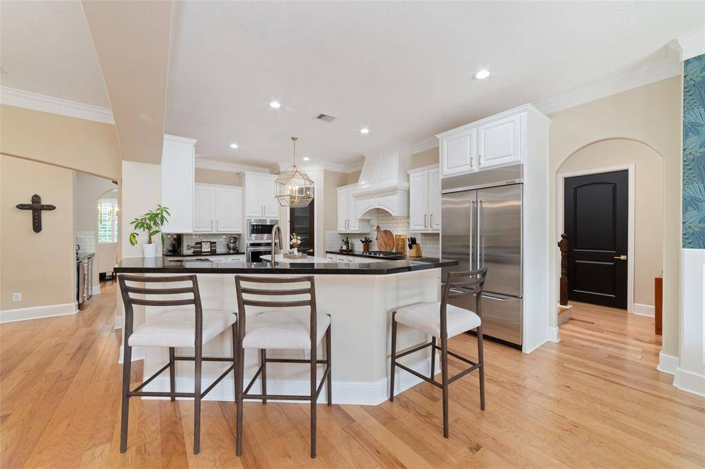 Kitchen that opens to your living room and breakfast area.