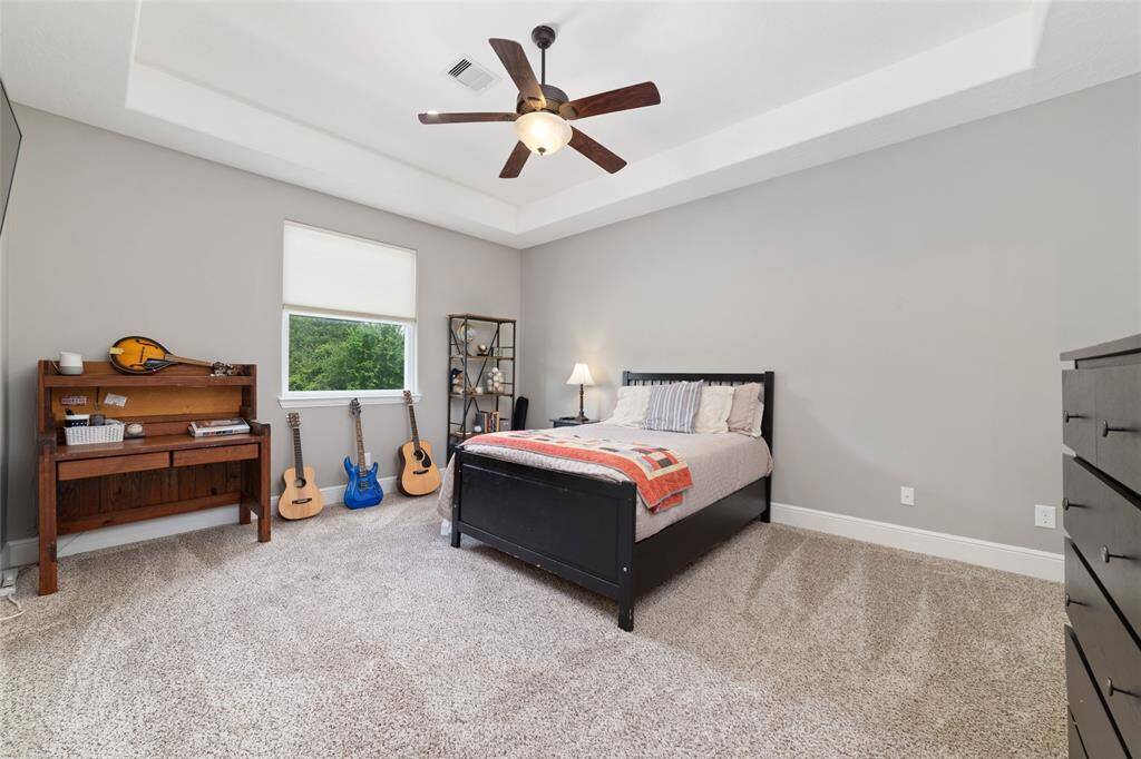 Huge game room w built in storage.