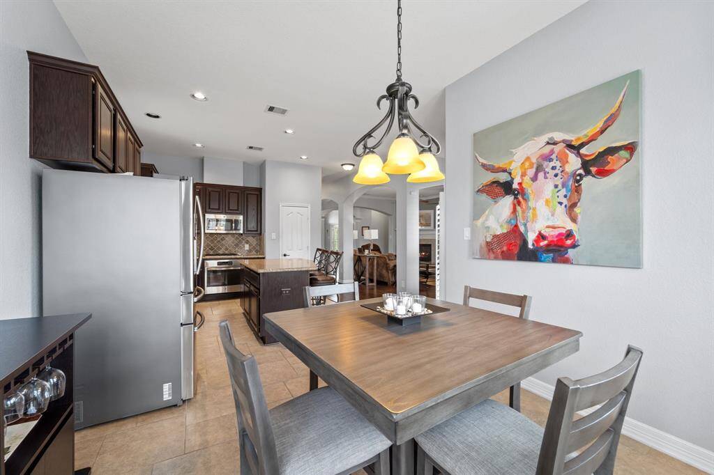 This charming breakfast area is also great for enjoying a solo cup of coffee or casual dining with the family.