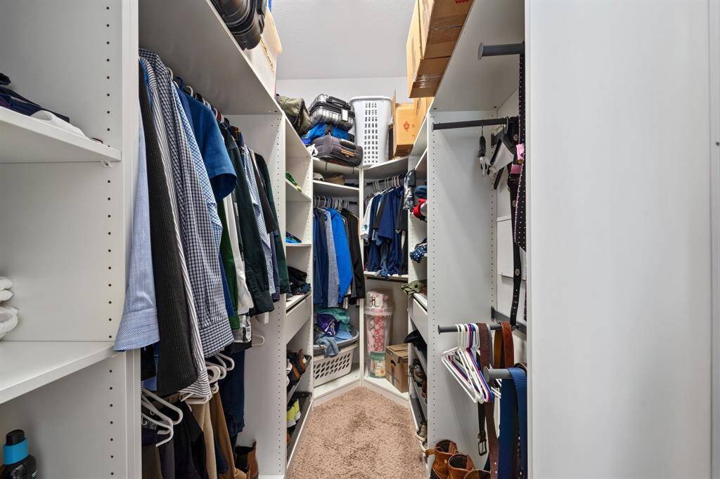 Spacious walk-in closet inside the primary bathroom.