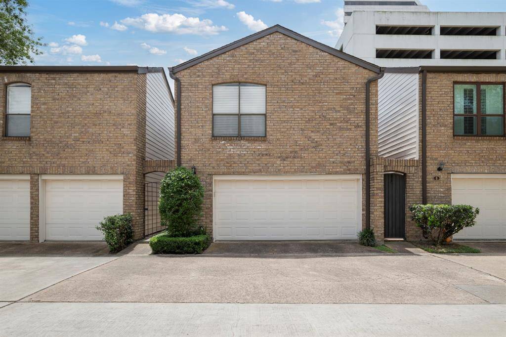 A two car garage and private entry on the left.