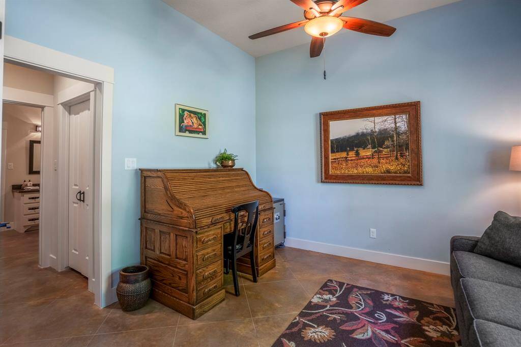 Main home study with access to guest bath and closet