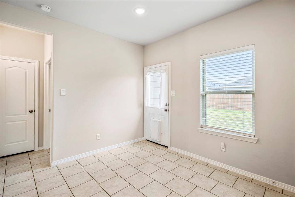 This Breakfast Room is connected to the kitchen, you could also easily add a kitchen island or coffee station too!