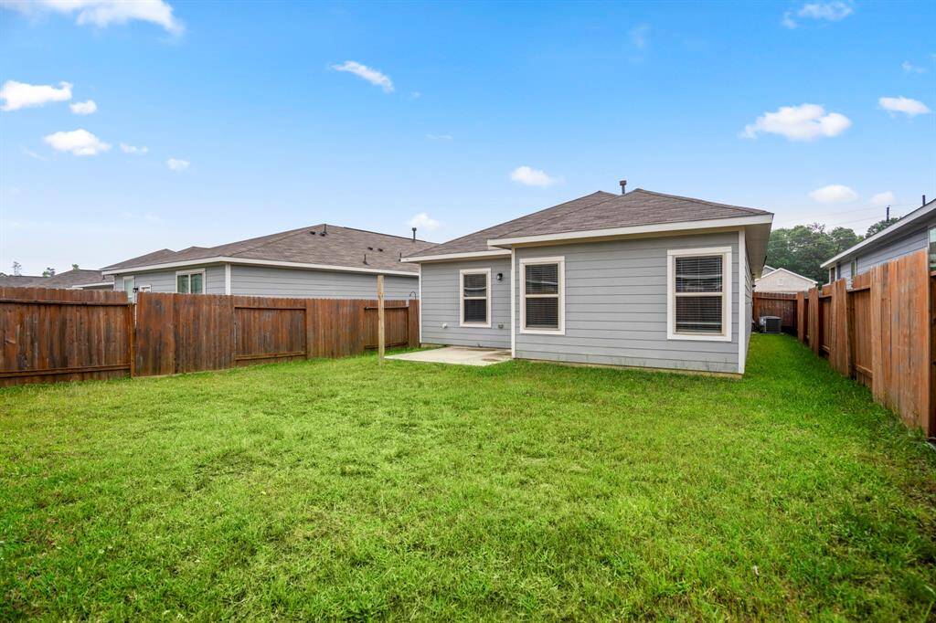 Yard is fully fenced for privacy and safety.