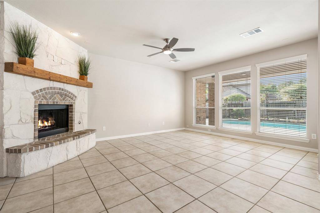 Another view of the living room that is open to the kitchen.