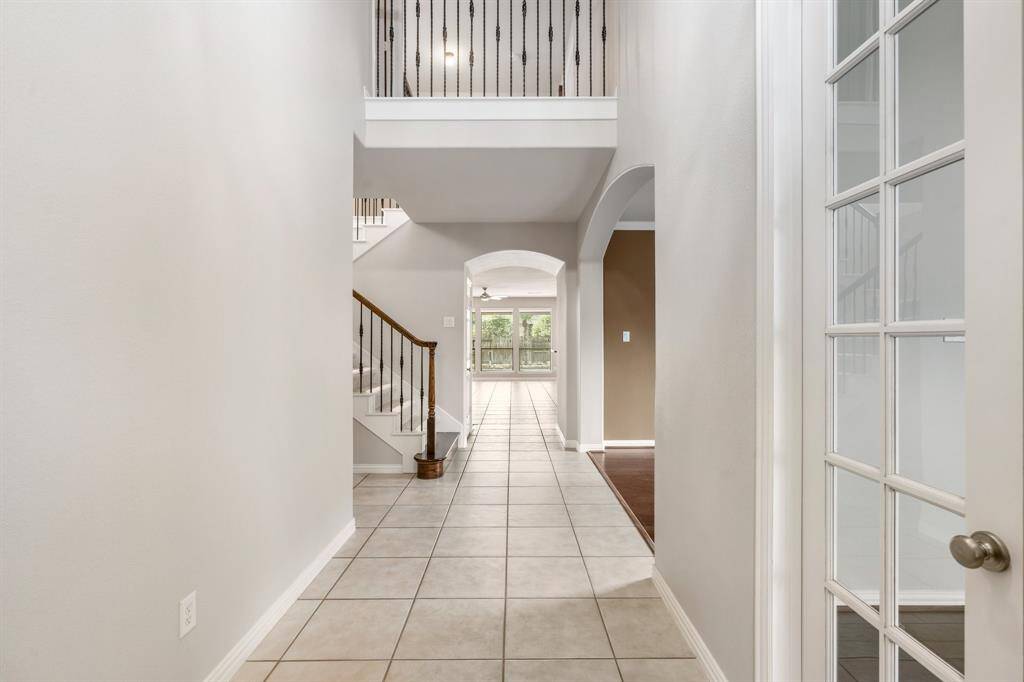 Enter the home into the 2 story foyer with the study and dining room on your right.