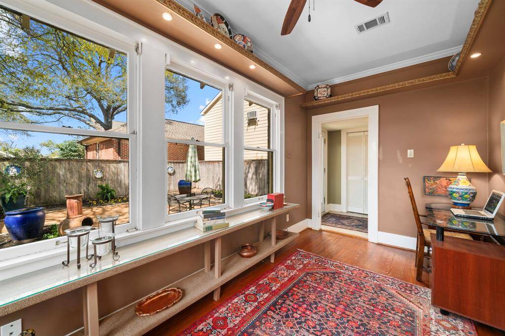 Look at all of that natural light, and views into your landscaped backyard!