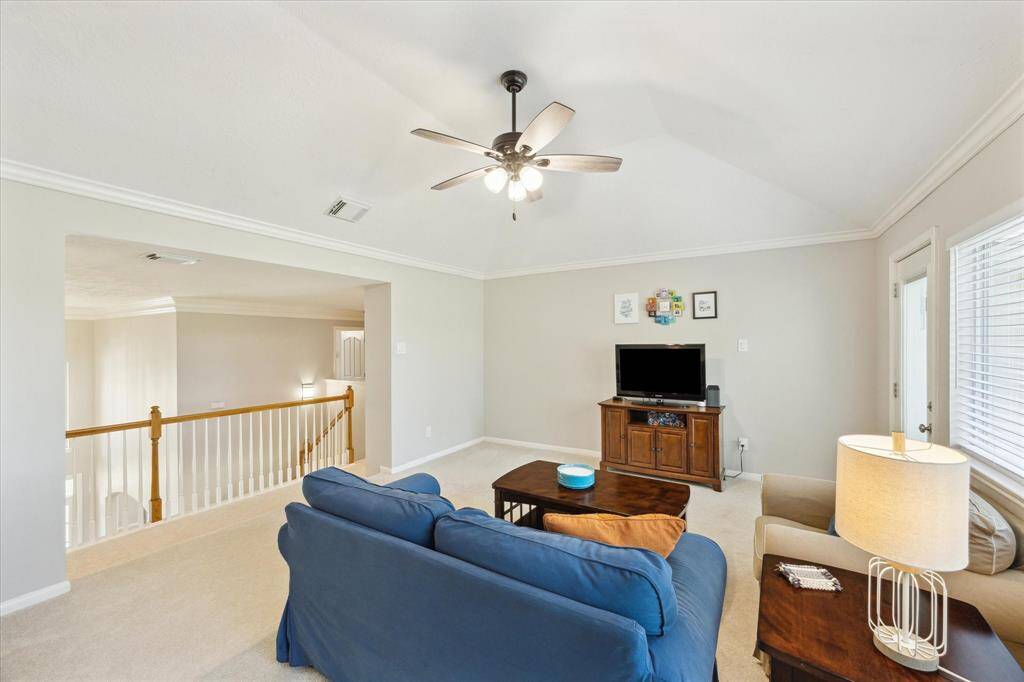 Down the hall from the game room are 3 bedrooms.