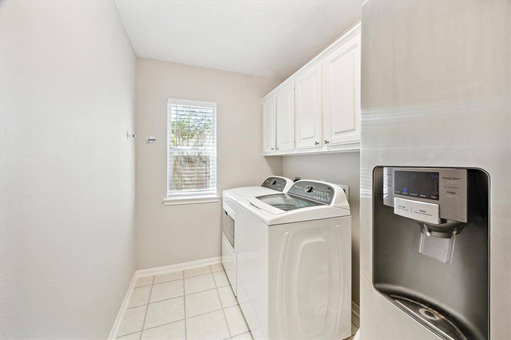 A nice sized laundry room is downstaris off the kitchen.