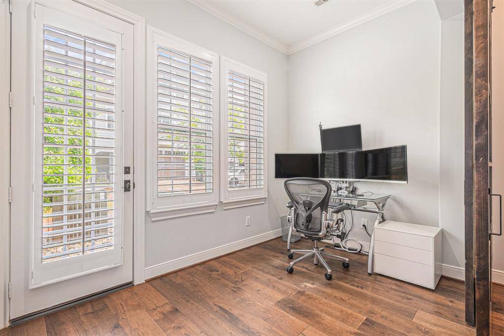2nd office space with plantation shutters.