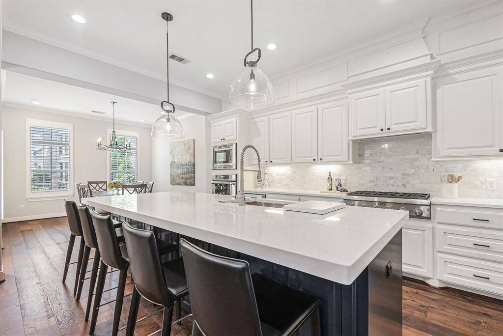Another view of the kitchen that is open to the dinning room.