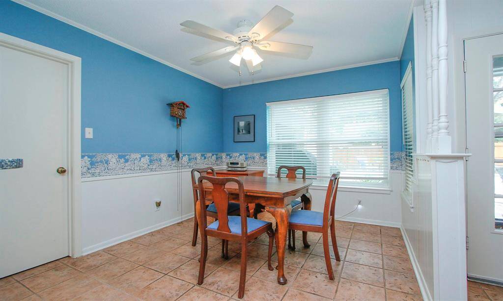 Breakfast area over looking the pool.  Door on the left leads to the utility room
