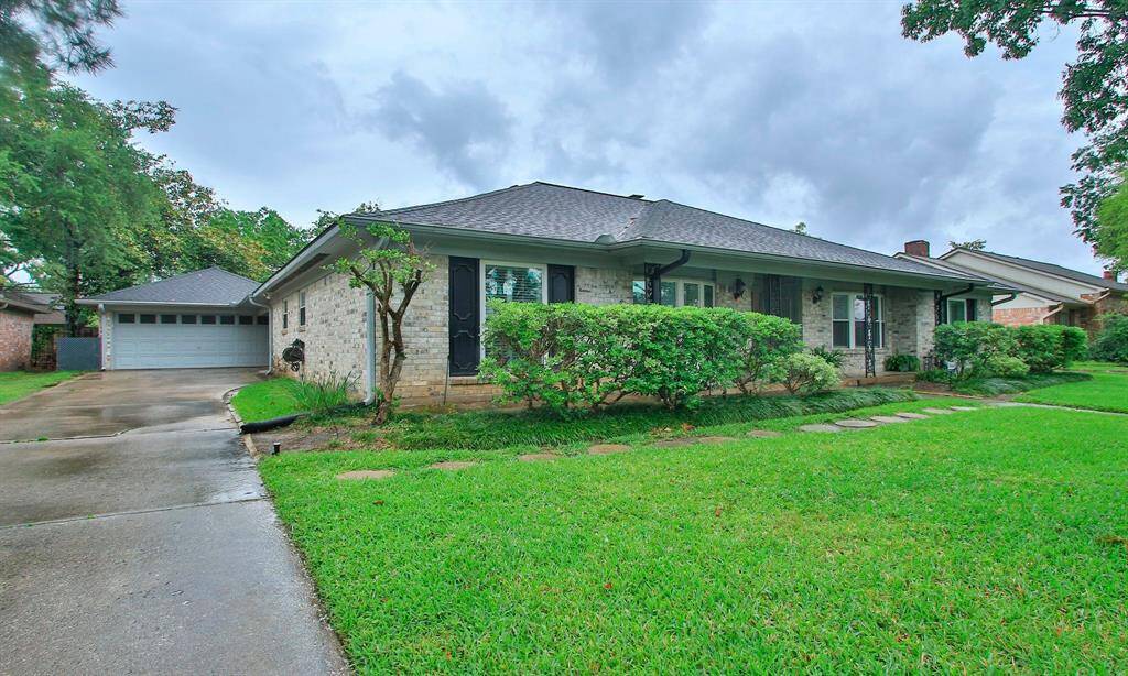 The home has a nice long driveway with a detached 2 car garage.
