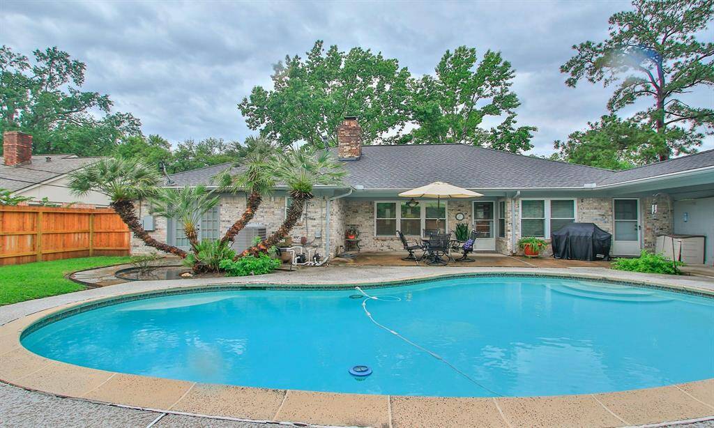 Spacious backyard with sparkling pool.  Great space for entertaining.