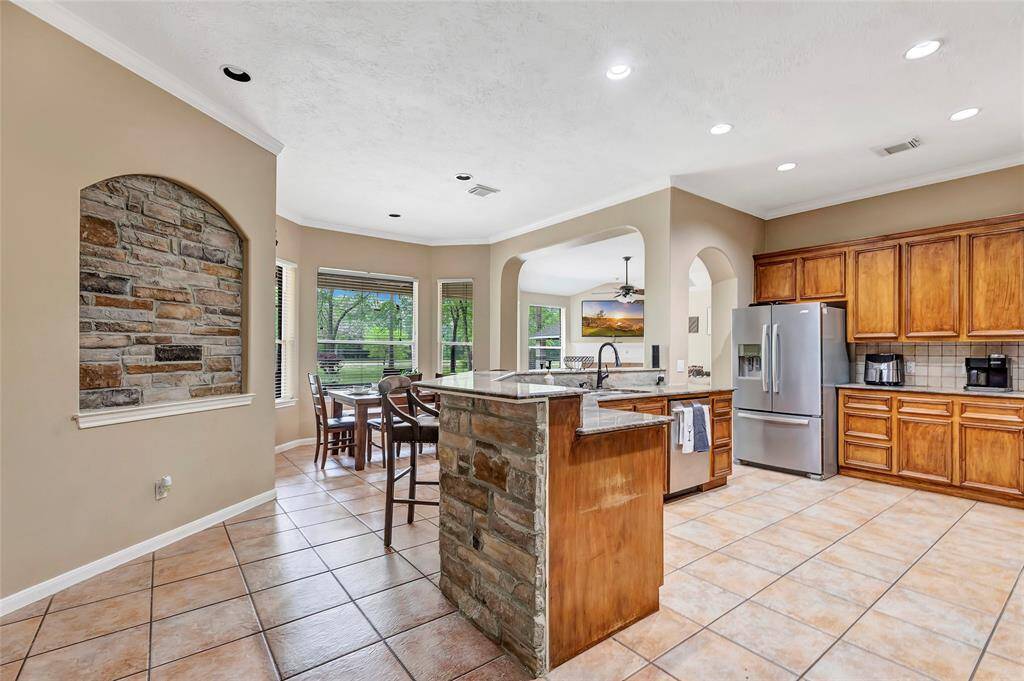 Open Concept Kitchen complete with Granite Counters