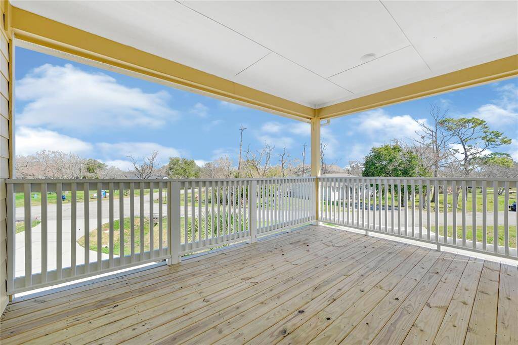 upstairs balcony facing the street and park.