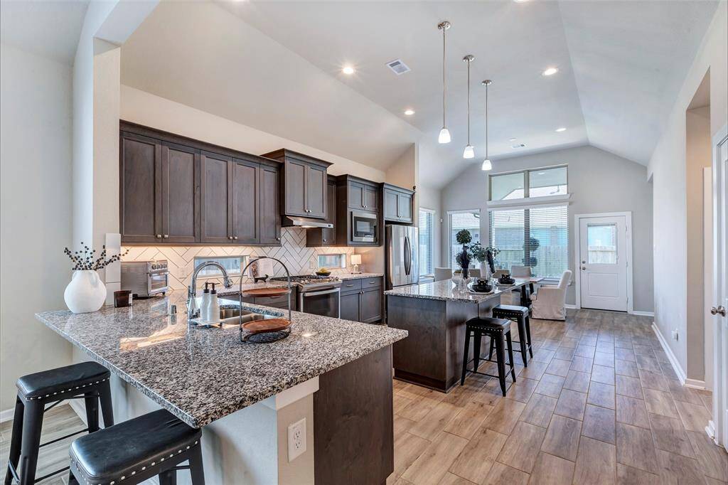 Welcome to this beautiful kitchen—where culinary magic comes to life! Stylish, functional, and ready for your next delicious creation.