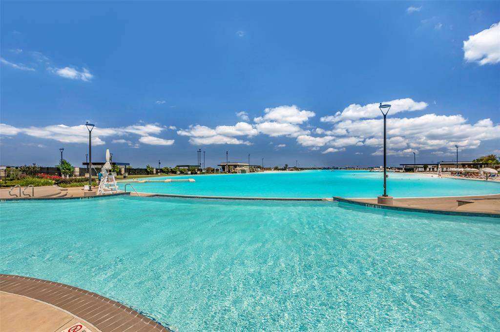 An expansive pool with stunning, open views of the community.
