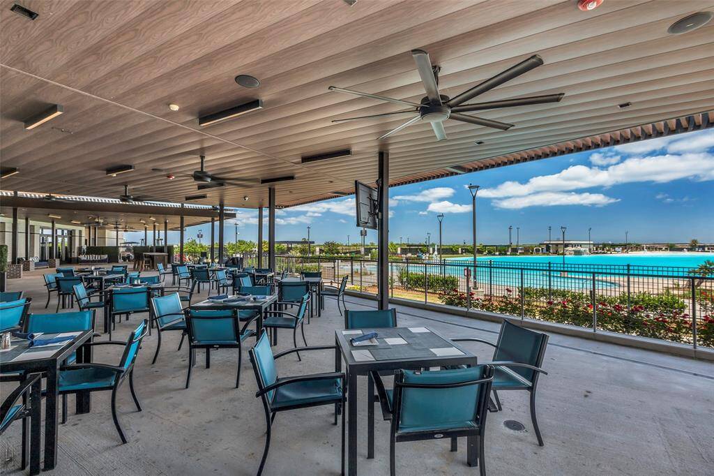 A cozy dining and lounging area within the community, offering a perfect space to relax, socialize, or enjoy a meal outdoors.