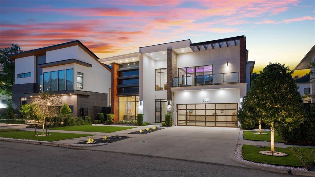 This striking contemporary home is located in a neighborhood between Highland Village and River Oaks