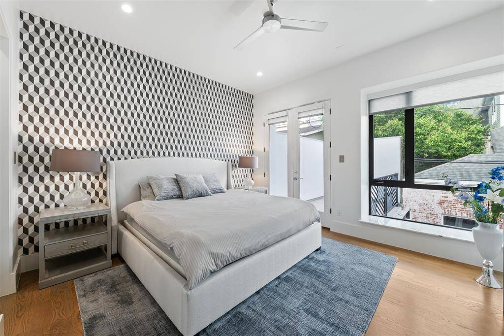 Secondary bedroom with its own balcony to the backyard.