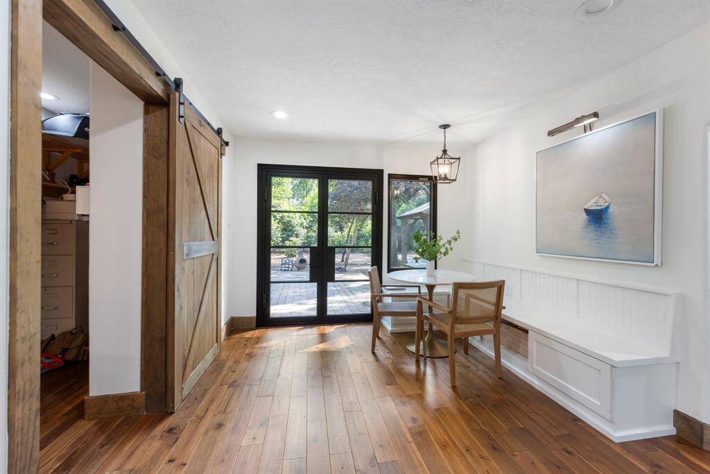 Off the kitchen is the breakfast nook and built-in office nook with access to the back patio.