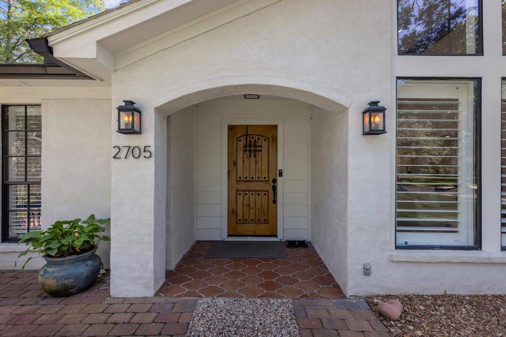 Newly done brick restoration whitewash for stunning curb appeal.