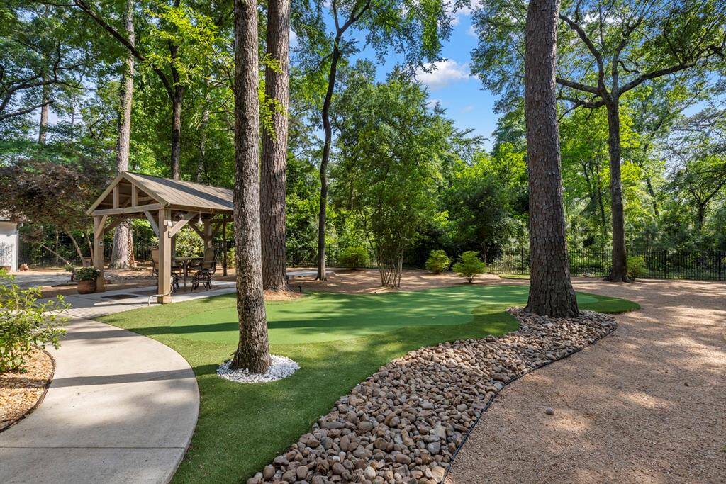 Enjoy gate access to the walking trail behind the property!